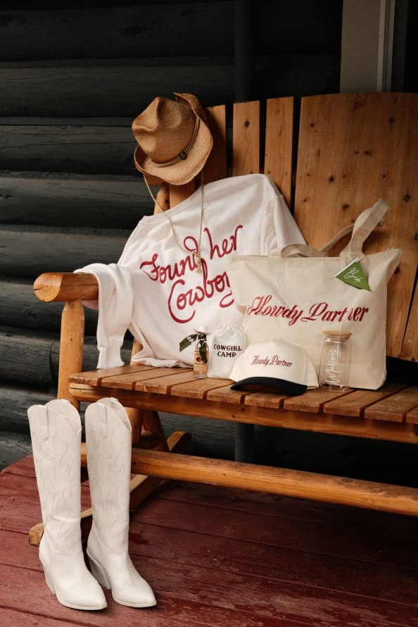 A beautiful pair of cowboy boots and a cowboy hat with fun western accessories await the bachelorette.